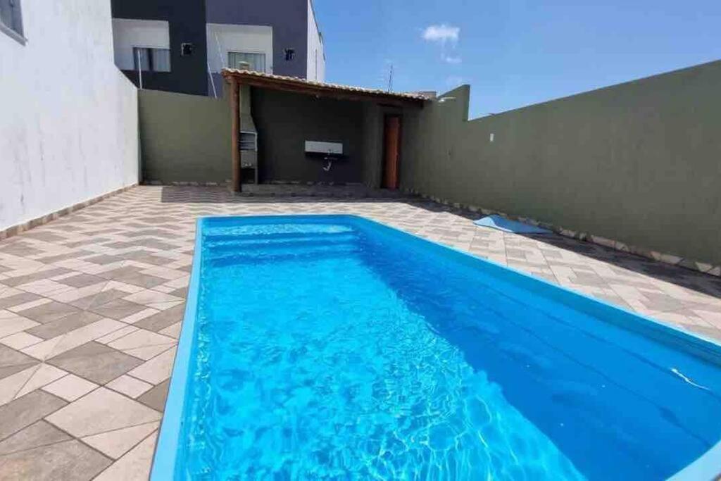Apto térreo 2Q condomínio c/ piscina, churrasqueira e garagem - a apenas 1km da Axé Moi