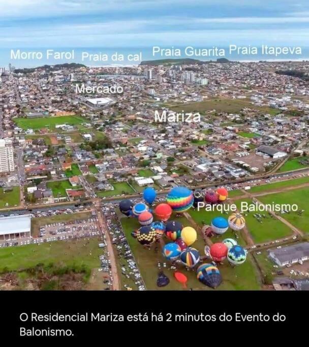 KITNET S4 em TORRES-RS - Confortável com cama casal box, cama de solteiro bicama, televisão, geladeira, micro-ondas, chaleira elétrica, ar-condicionado spl