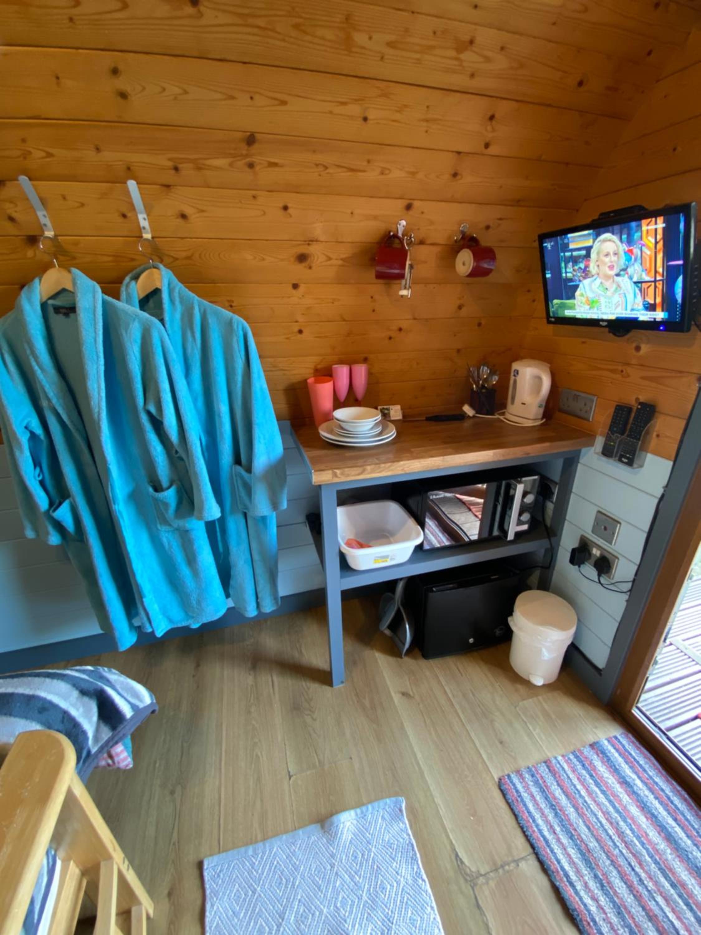 Country pod with wood fired hot tub view 2
