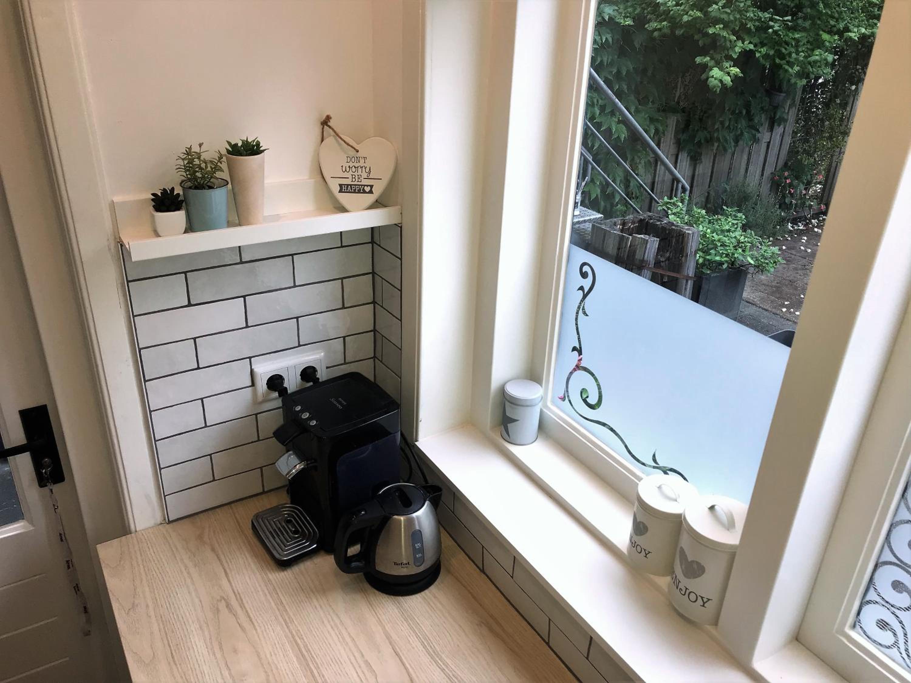 Sfeervolle parterre-suite met tuin bij centrum en station