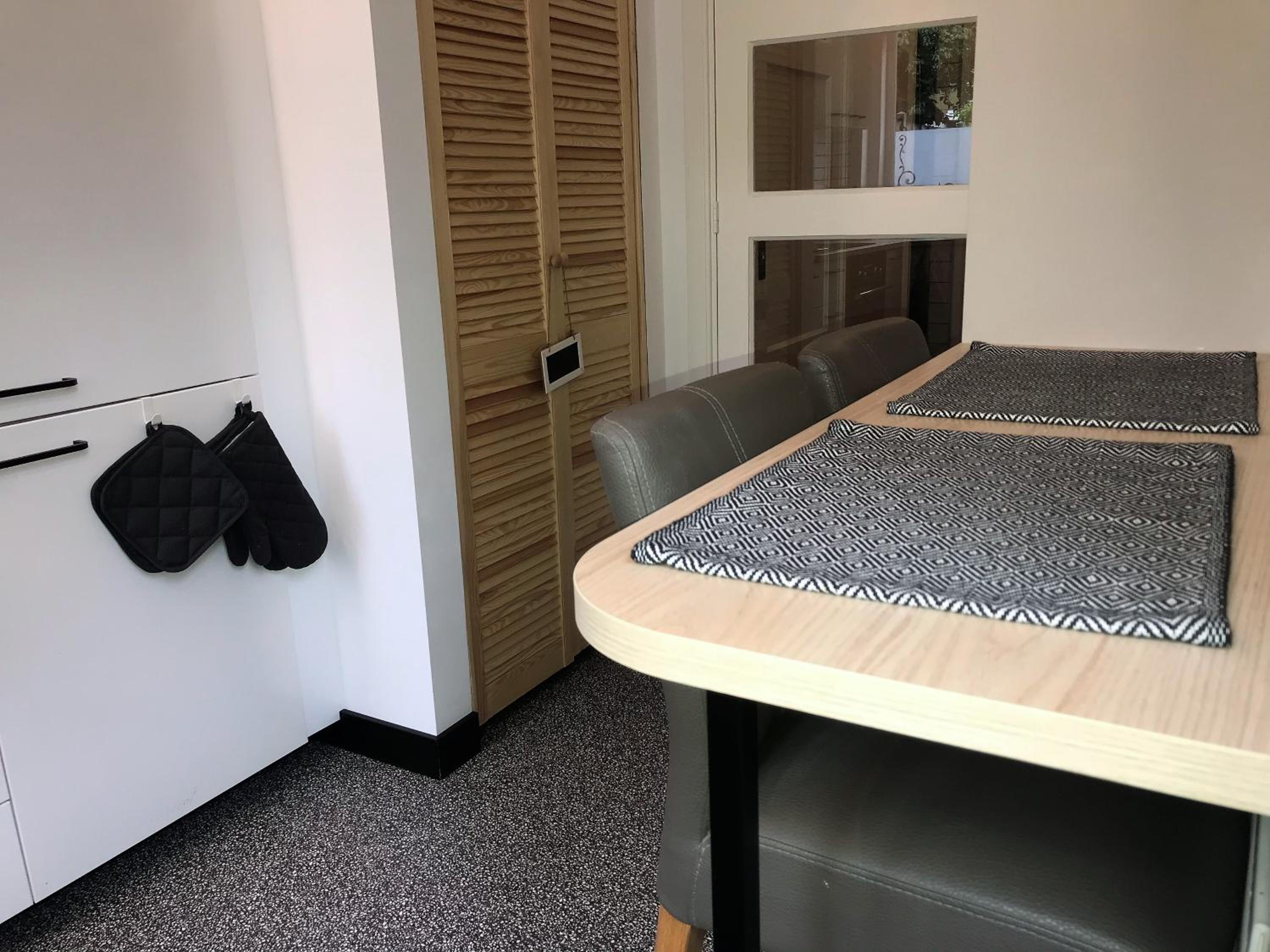 Sfeervolle parterre-suite met tuin bij centrum en station
