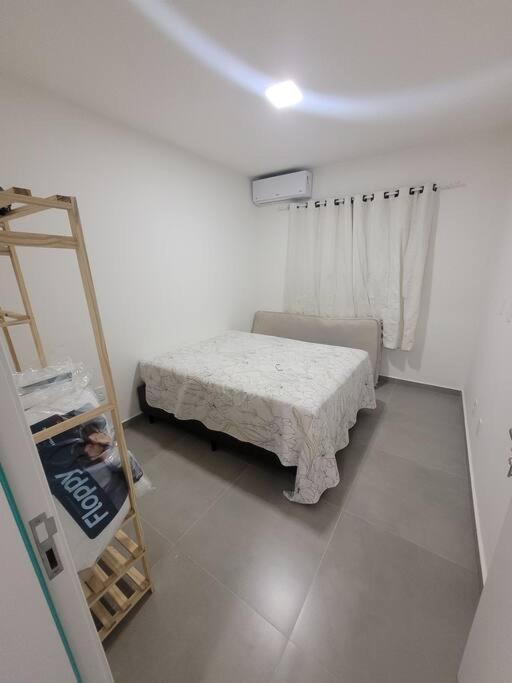 Casa com piscina e espaço gourmet 300m do mar