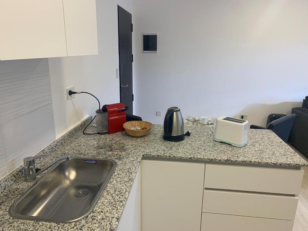 Altos de la Cañada en Moreno — kitchen