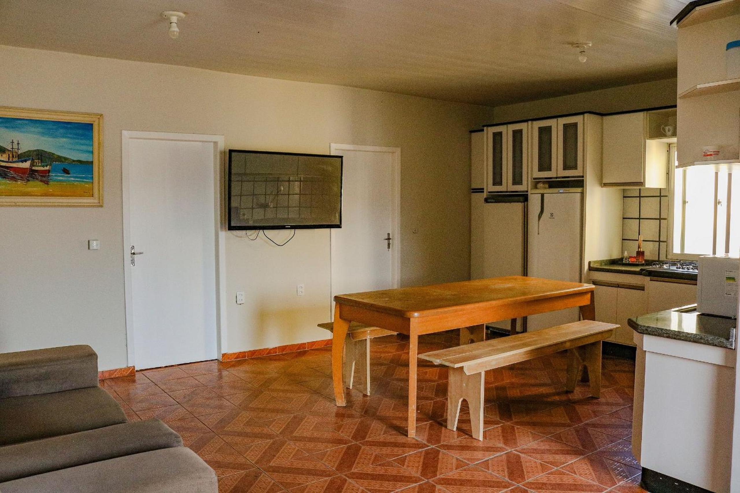 Casa pé na areia com vista especial do pôr do sol.