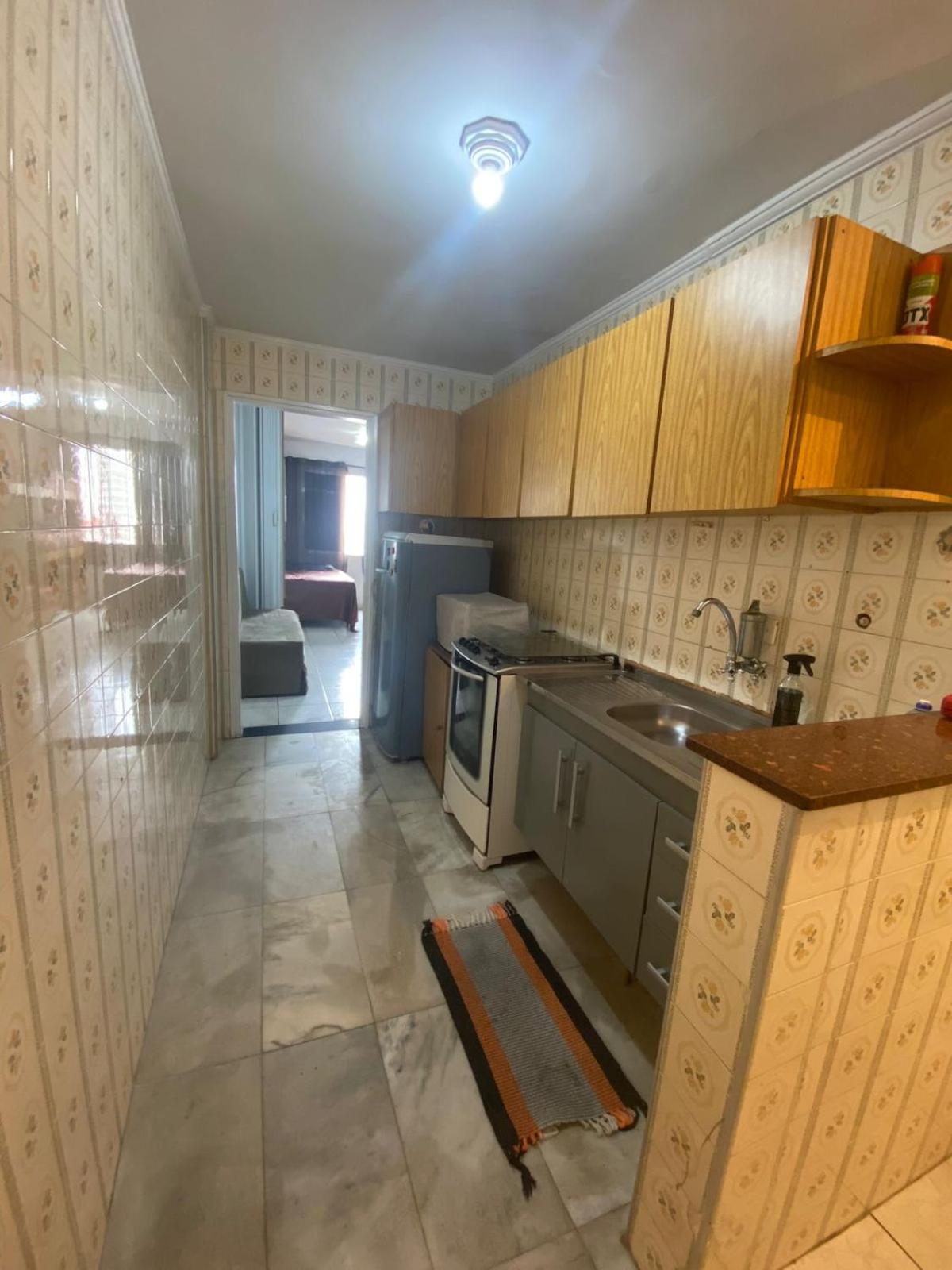 Apartamento kitnet pé na areia praia Ocian