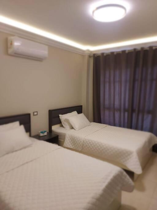 Tranquil Apartment with a garden in Madinaty