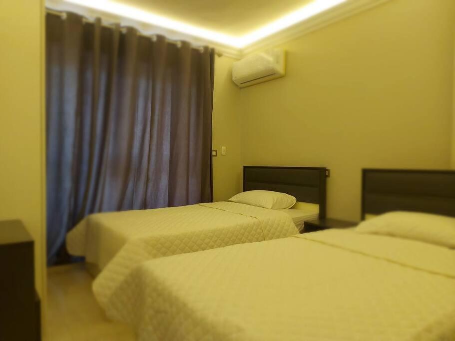 Tranquil Apartment with a garden in Madinaty