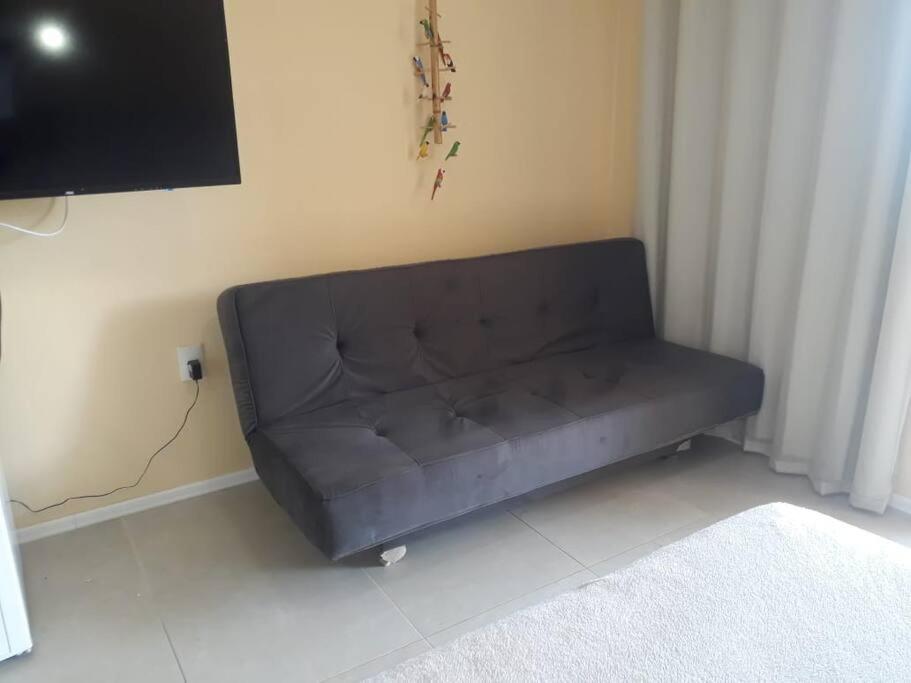 Flat aconchegante a uma quadra da praia