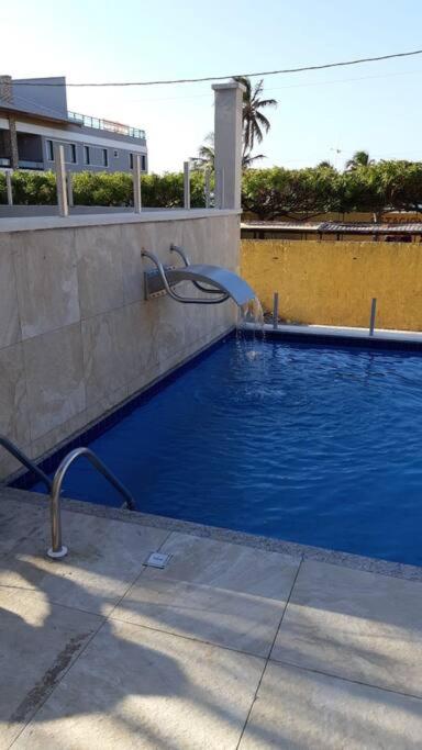 Flat aconchegante a uma quadra da praia