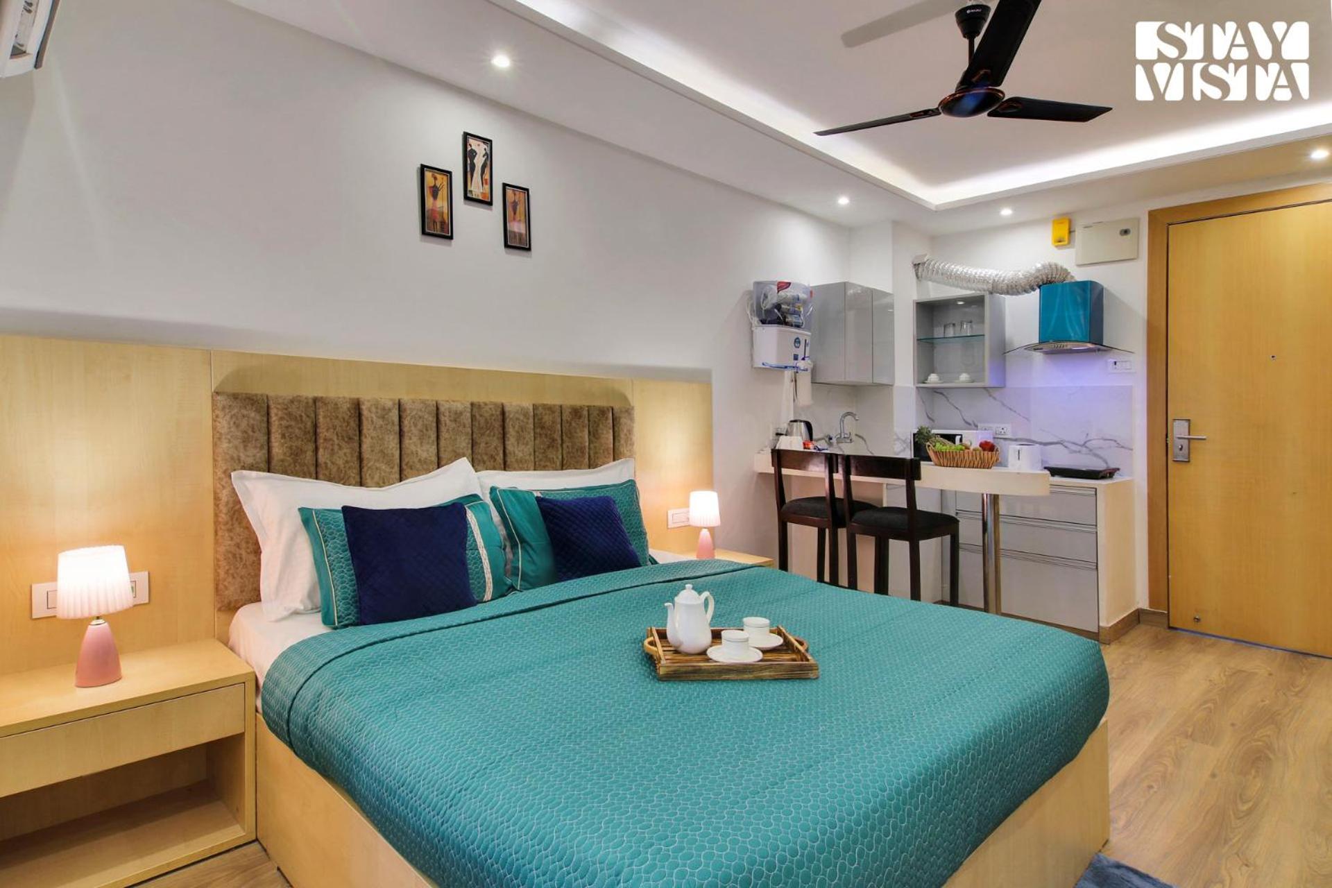 StayVista's Skyline Studio Apartments - Urban Oasis with Terrace, Gym & Bar