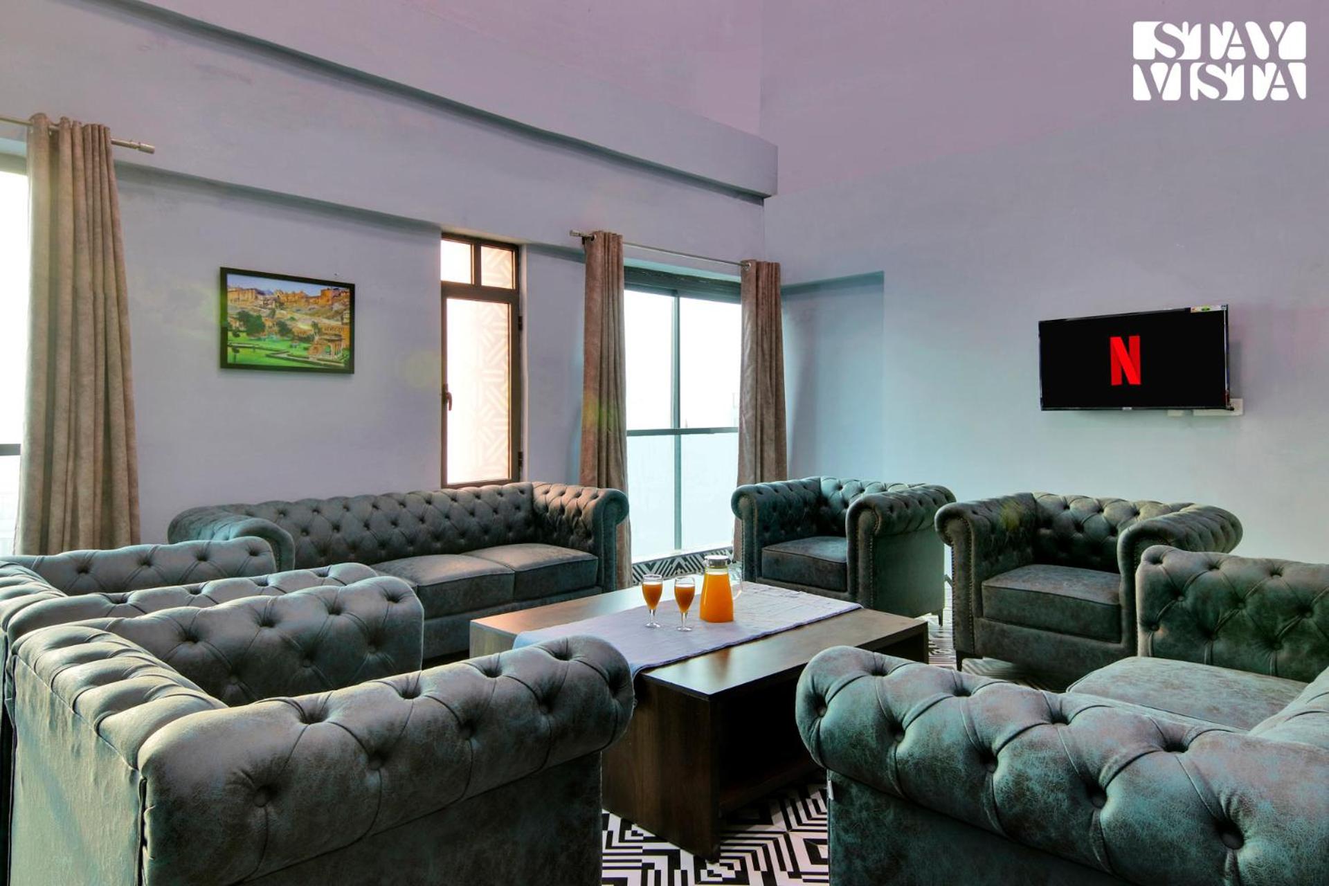 StayVista's Skyline Studio Apartments - Urban Oasis with Terrace, Gym & Bar