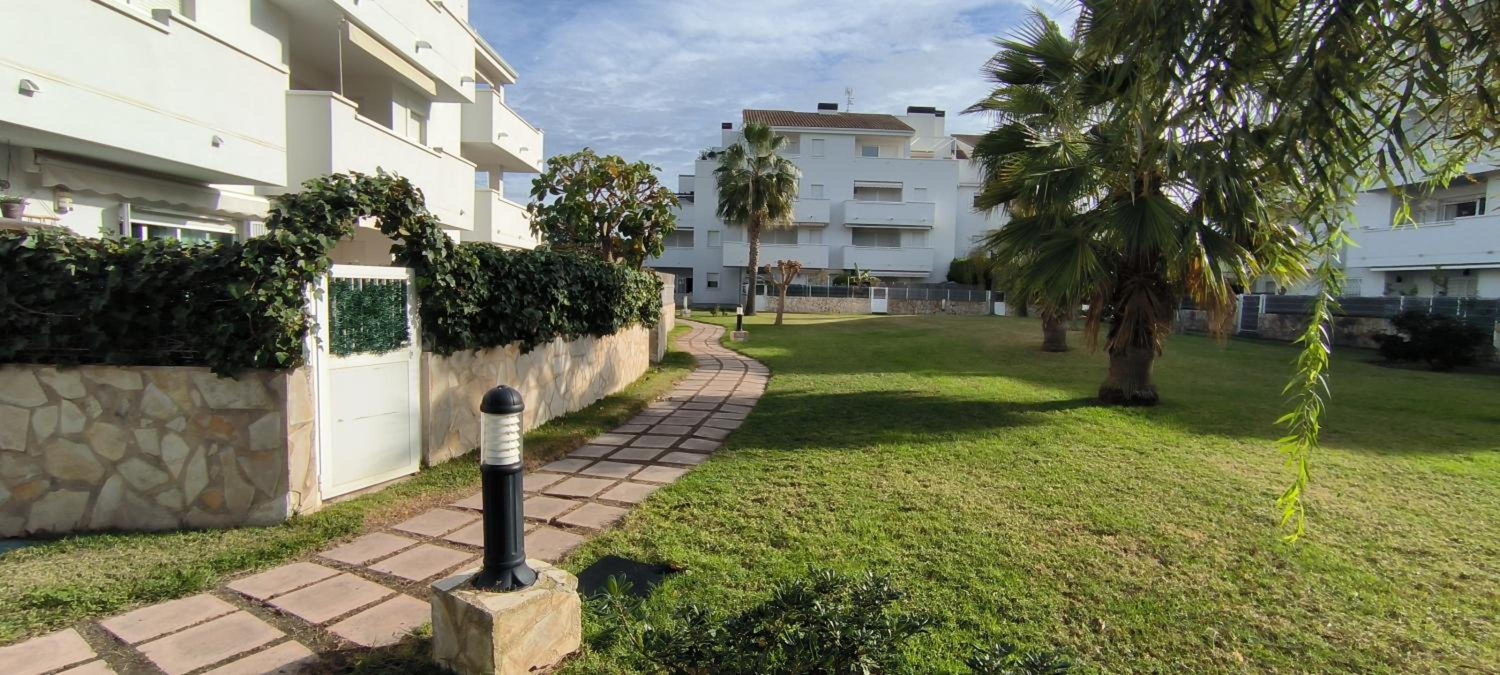 Denia Beach Apartment Jardín privado y piscina