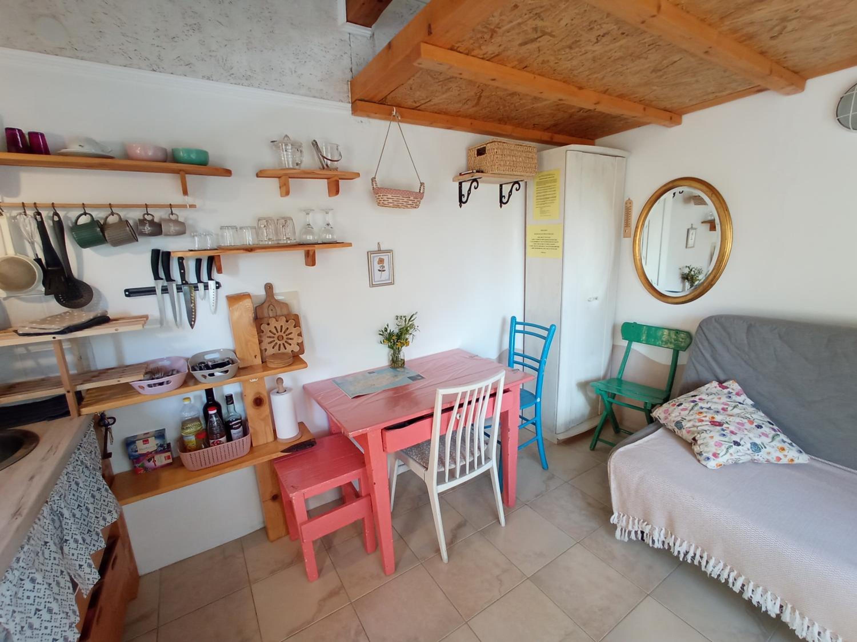 A tiny sea home in the wilderness view 4