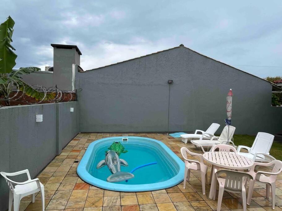 Casa para até 8 pessoas com piscina - Xangri-lá
