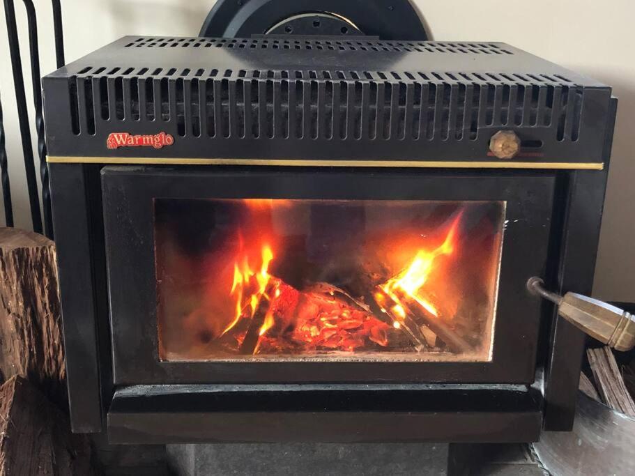 Kimberley Blue West Wing Sunny Decks Cosy Fire