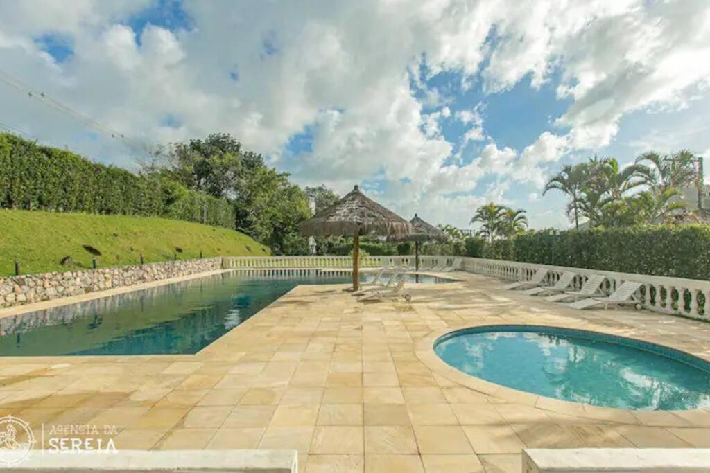 Casa charmosa condomínio de Pauba - 4 suites