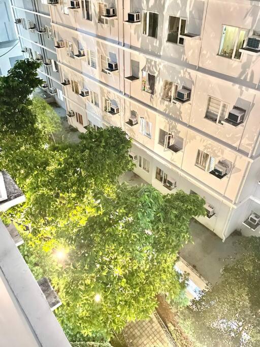 Cozy 1 BR Condo with PS4 at Trees Residences view 2