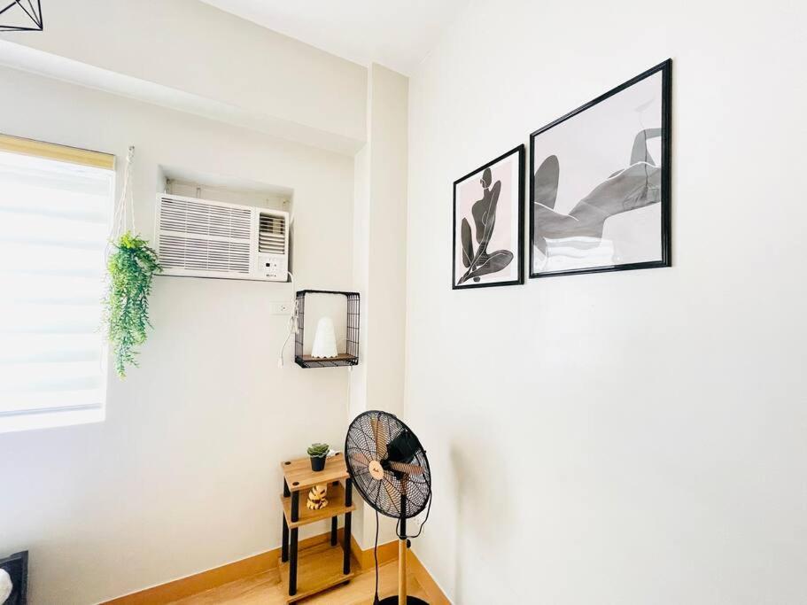 Cozy 1 BR Condo with PS4 at Trees Residences view 4