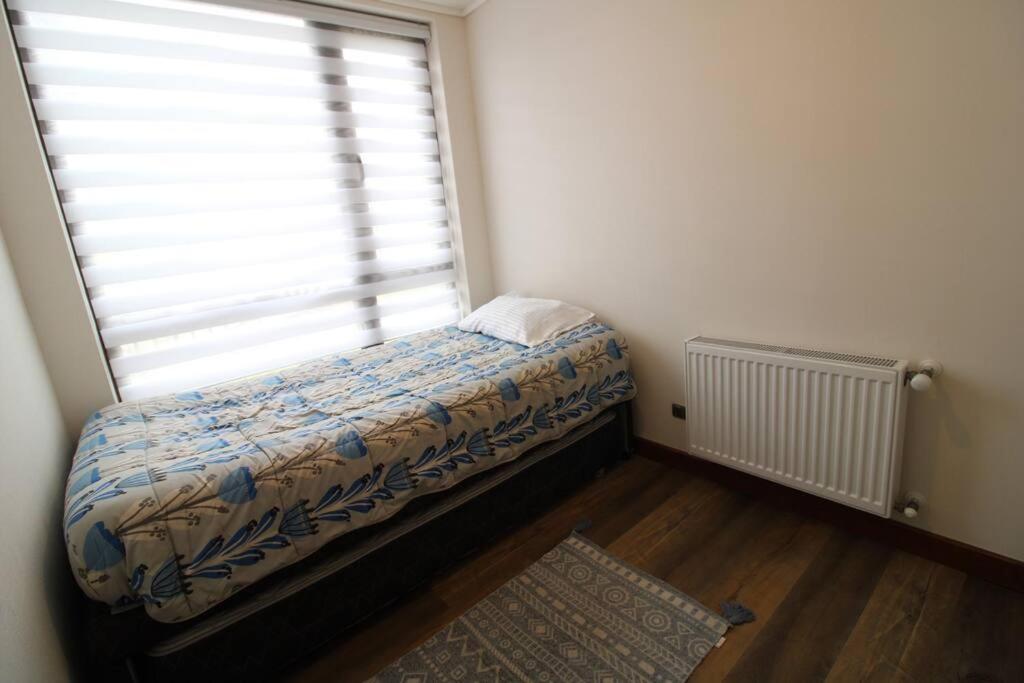 TuArriendoCL-MPHA106 Gran Depto en Pto Varas 3D2B 6PAX sin vista primer piso con jardin