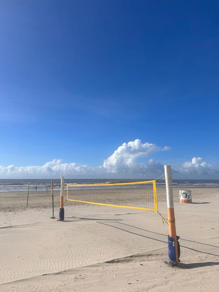 APTO BEIRA MAR - ACONCHEGANTE _ VARANDA GOURMET - WIFI - NETFLIX - TV A CABO - PRAIA GRANDE