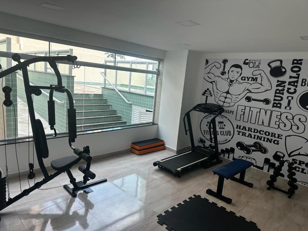 APTO BEIRA MAR - ACONCHEGANTE _ VARANDA GOURMET - WIFI - NETFLIX - TV A CABO - PRAIA GRANDE