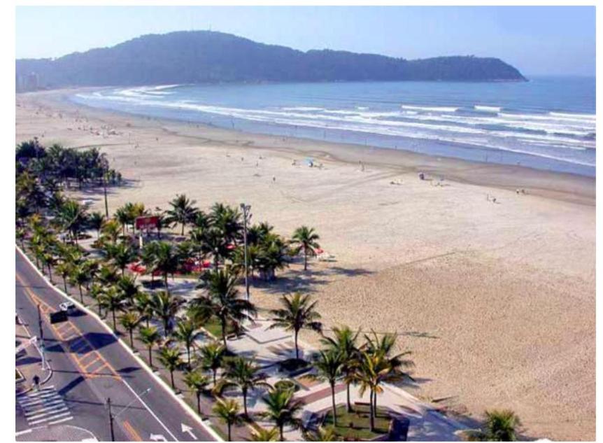 APTO BEIRA MAR - ACONCHEGANTE _ VARANDA GOURMET - WIFI - NETFLIX - TV A CABO - PRAIA GRANDE
