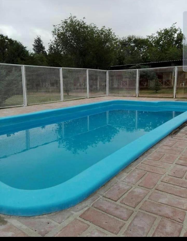 Los Nidos Dormis Habitaciones con baño privado y DEPARTAMENTOS