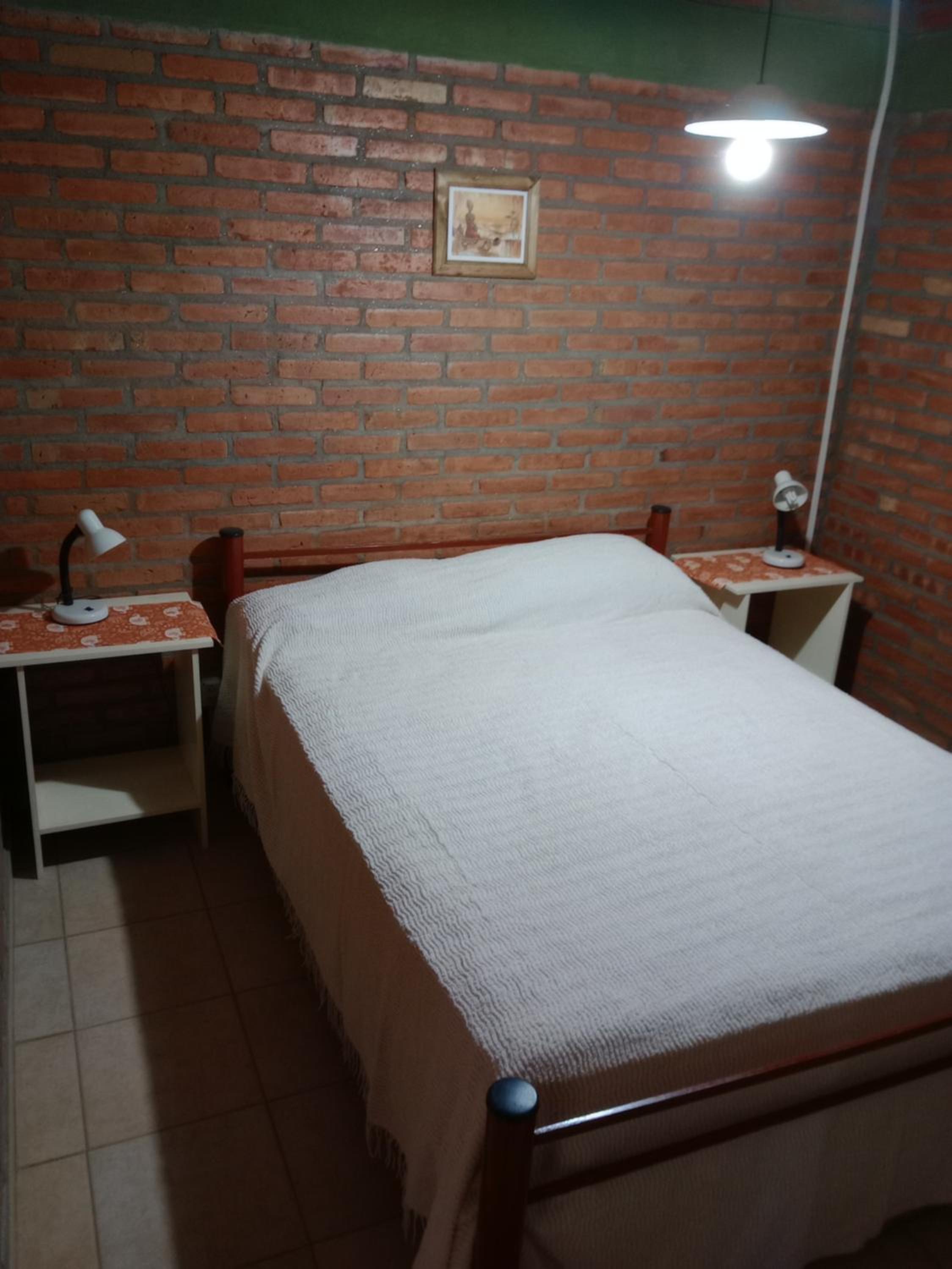 Los Nidos Dormis Habitaciones con baño privado y DEPARTAMENTOS