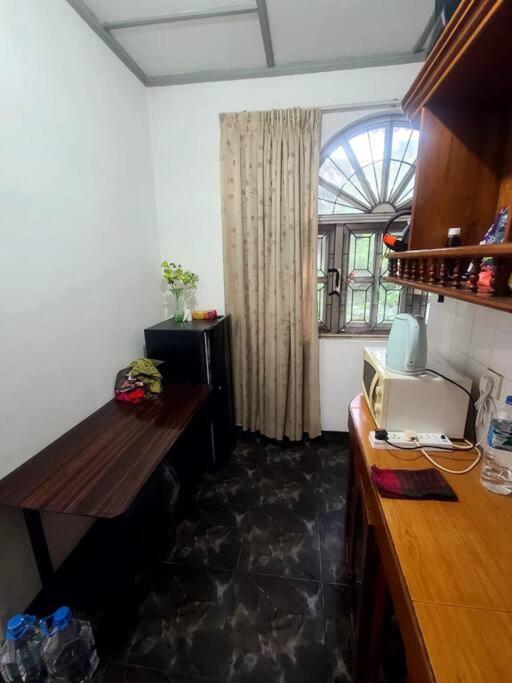 Sarojeni Apartments and Rooms