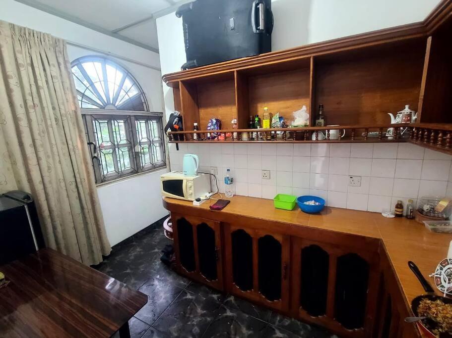 Sarojeni Apartments and Rooms