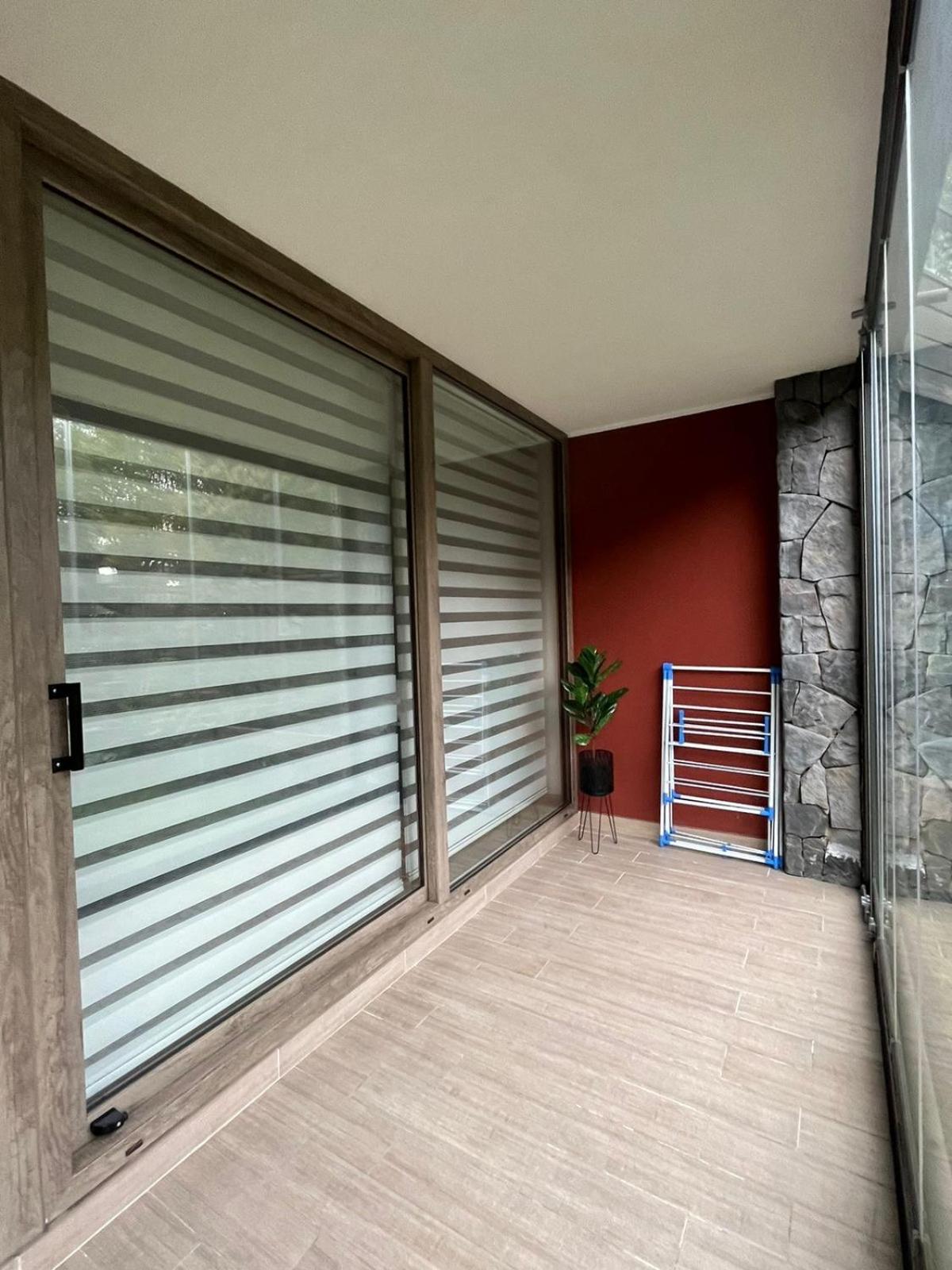 Depto. Pucón, terraza, piscina y estacionamiento