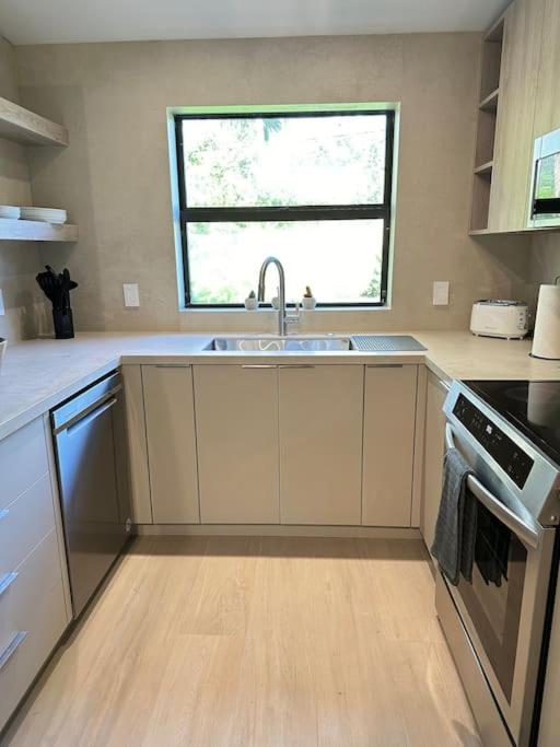 Coconut Grove Mid-Century Jungle Oasis