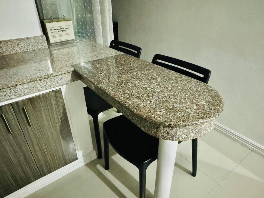 Birch Tower a1 front of RobinsonMla Rizal Park view 4