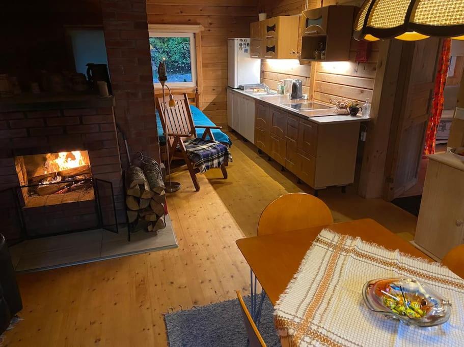 Hide in the nature – cozy lakeside saunacottage view 3
