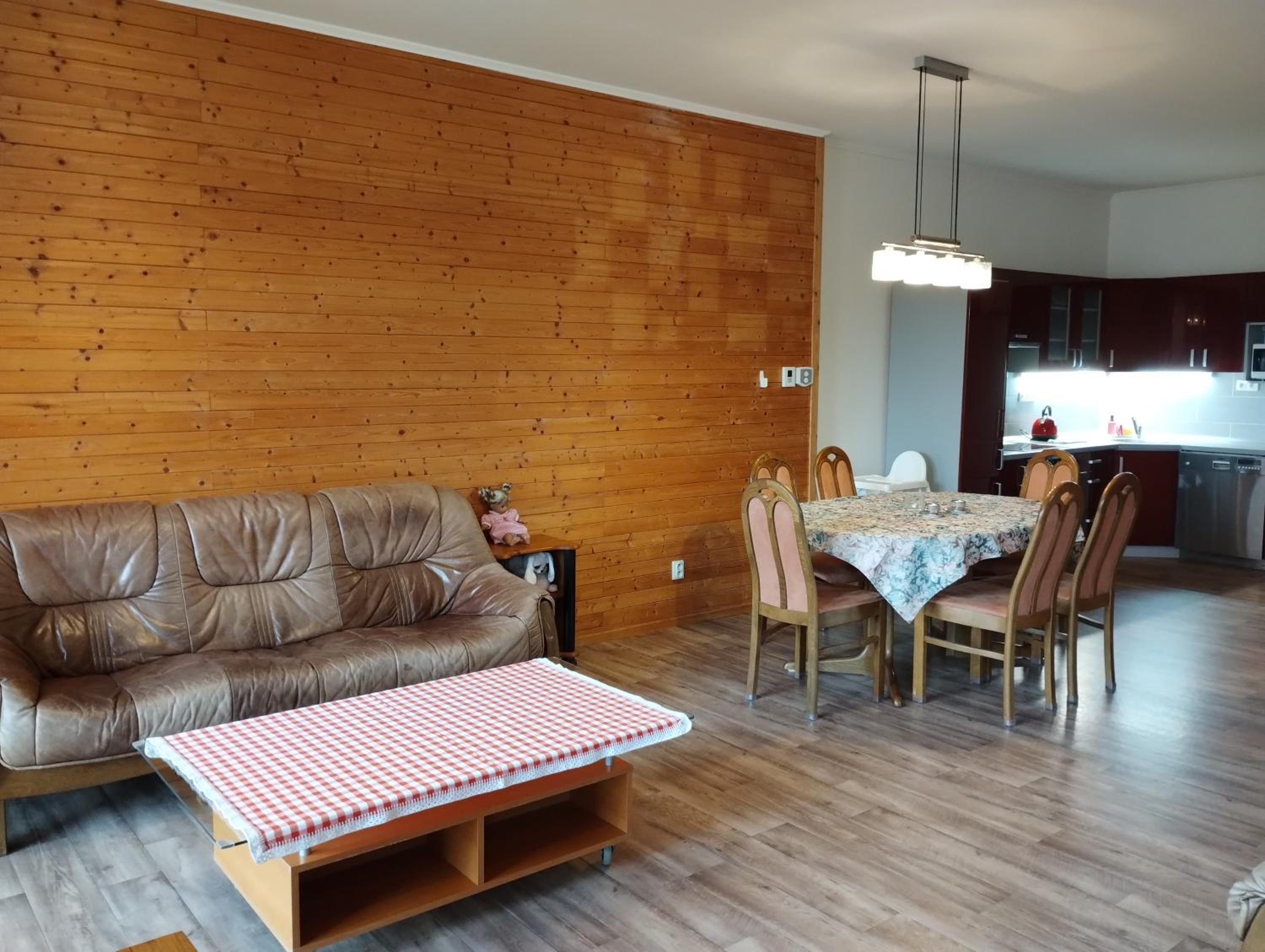 Apartmán v dřevěném domě