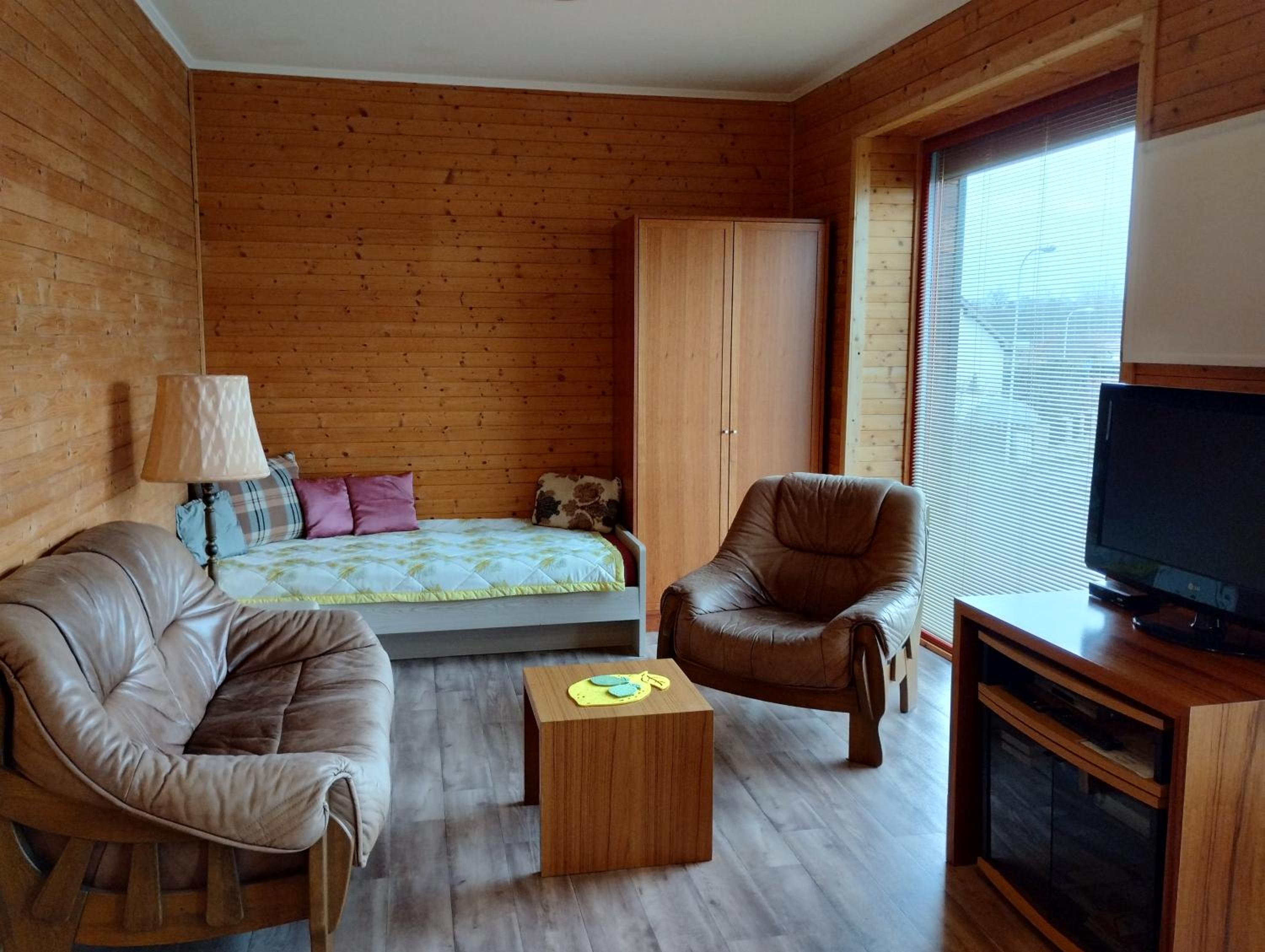 Apartmán v dřevěném domě
