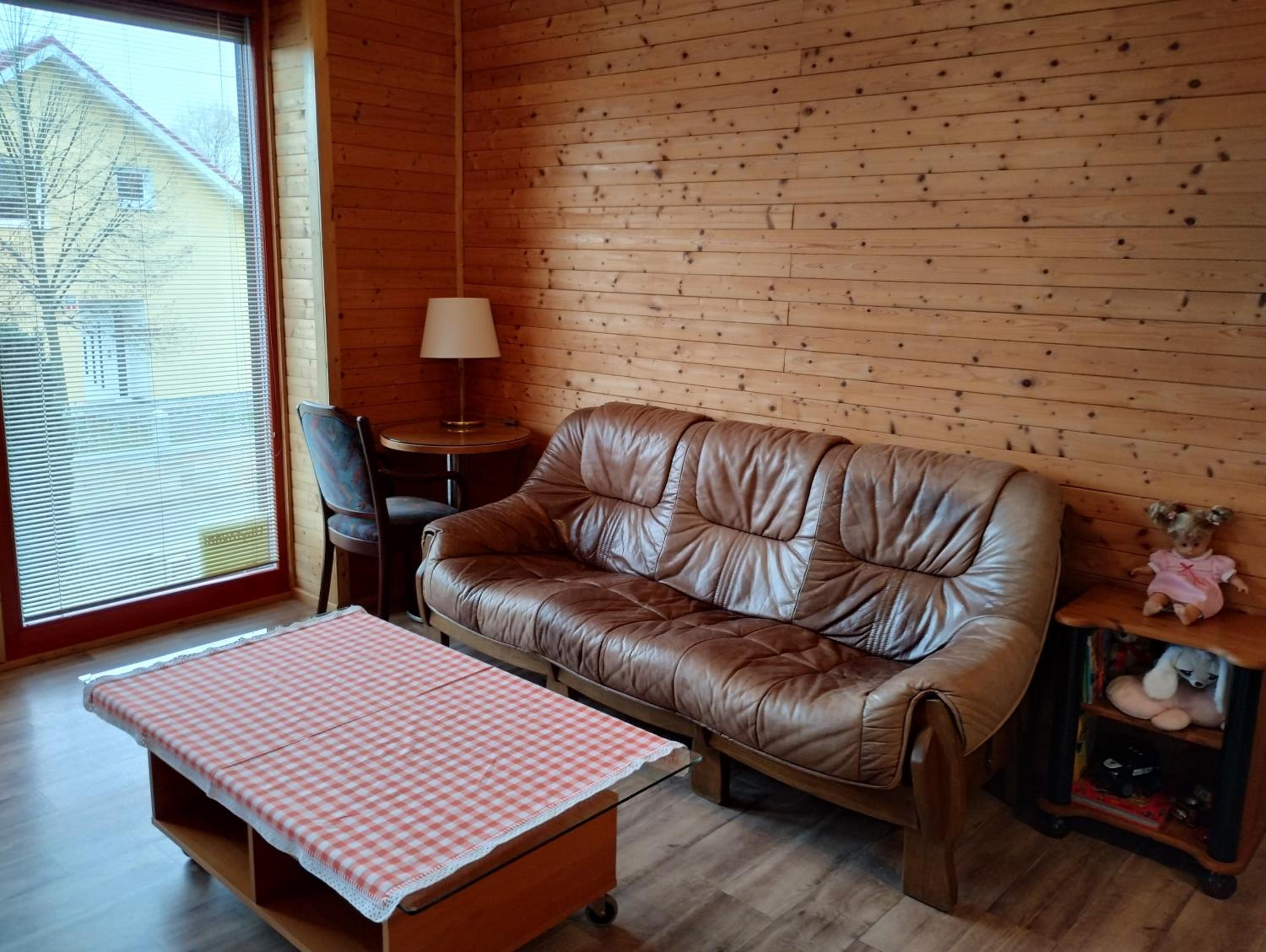 Apartmán v dřevěném domě