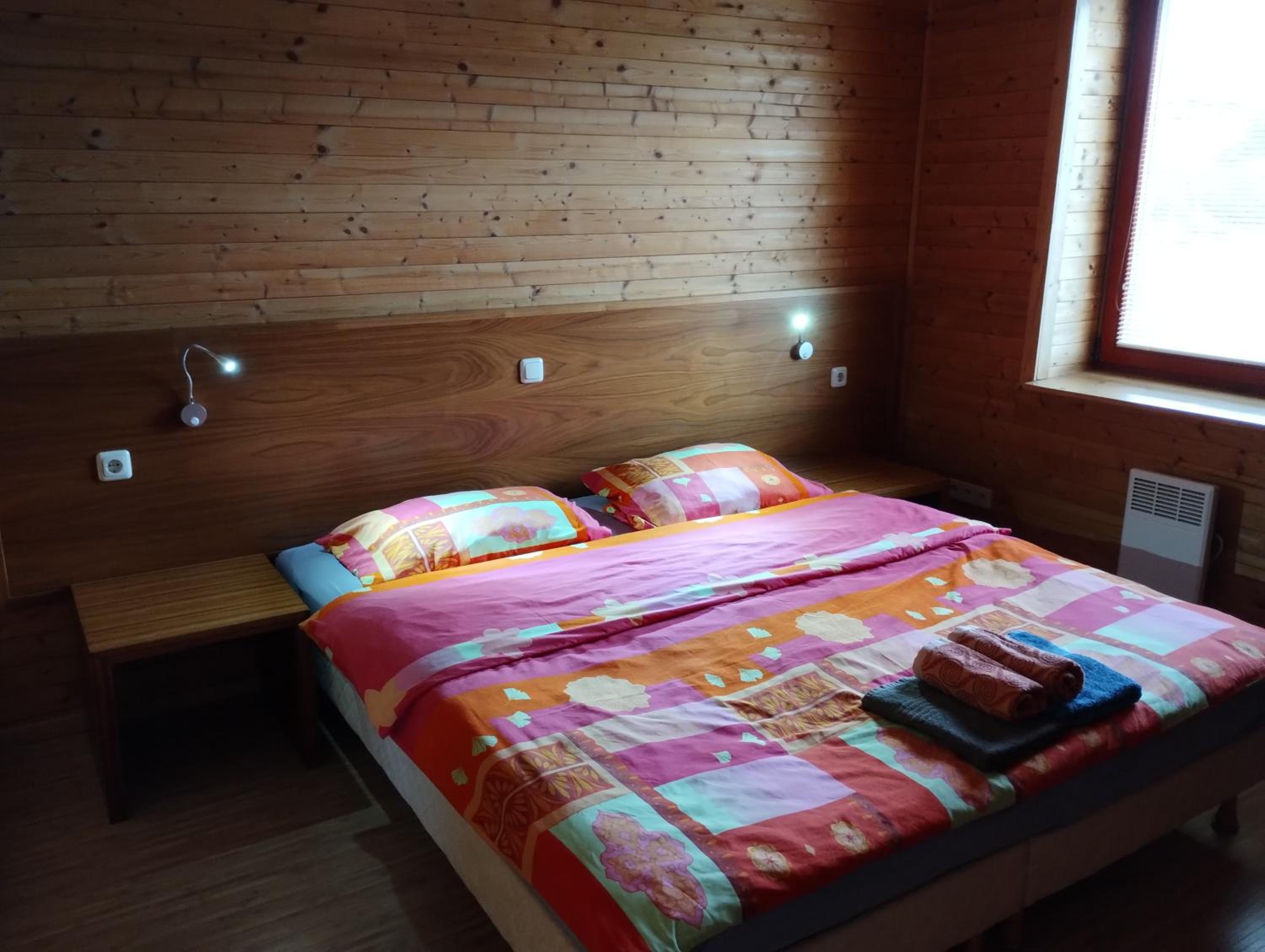 Apartmán v dřevěném domě