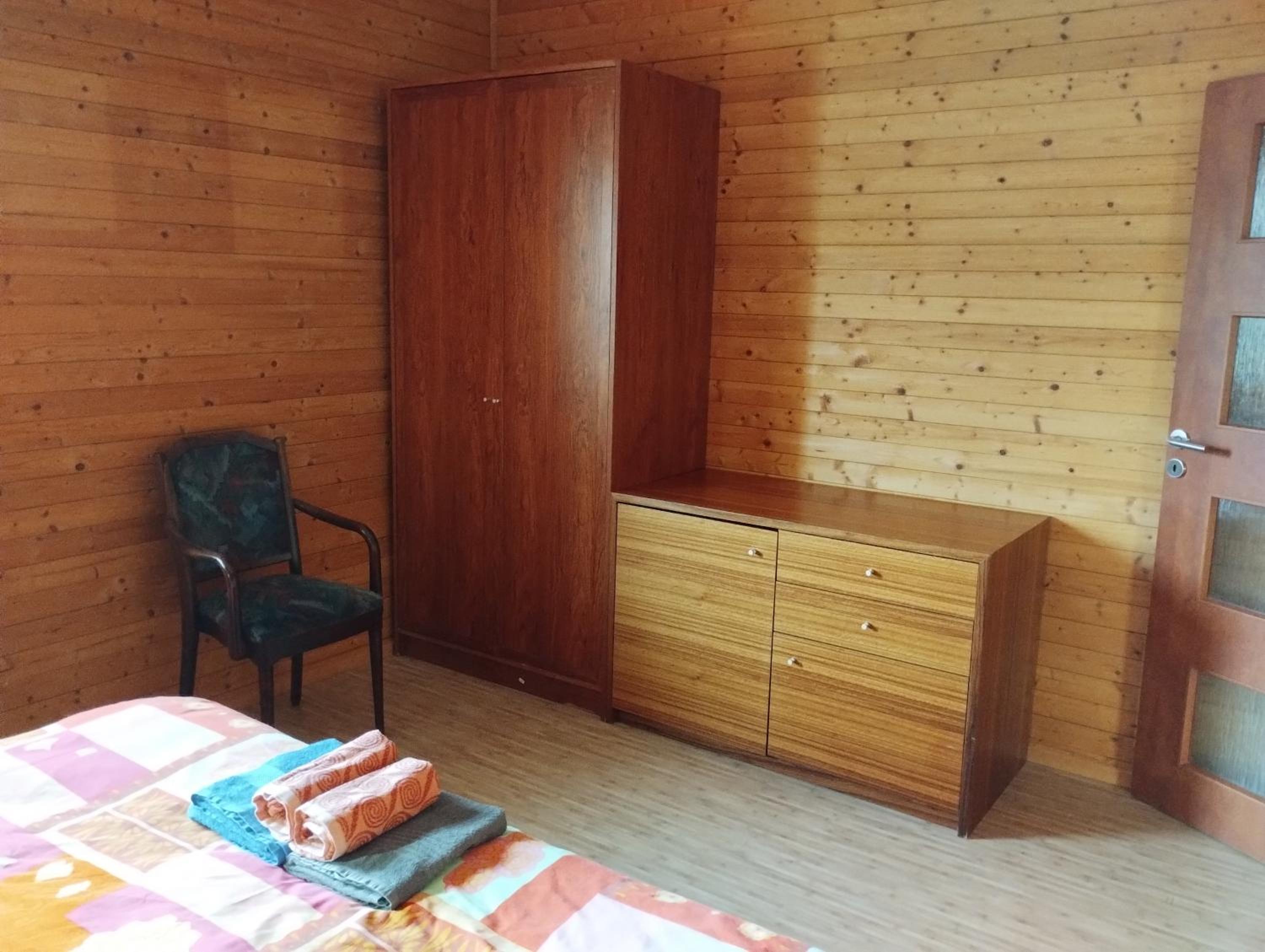 Apartmán v dřevěném domě