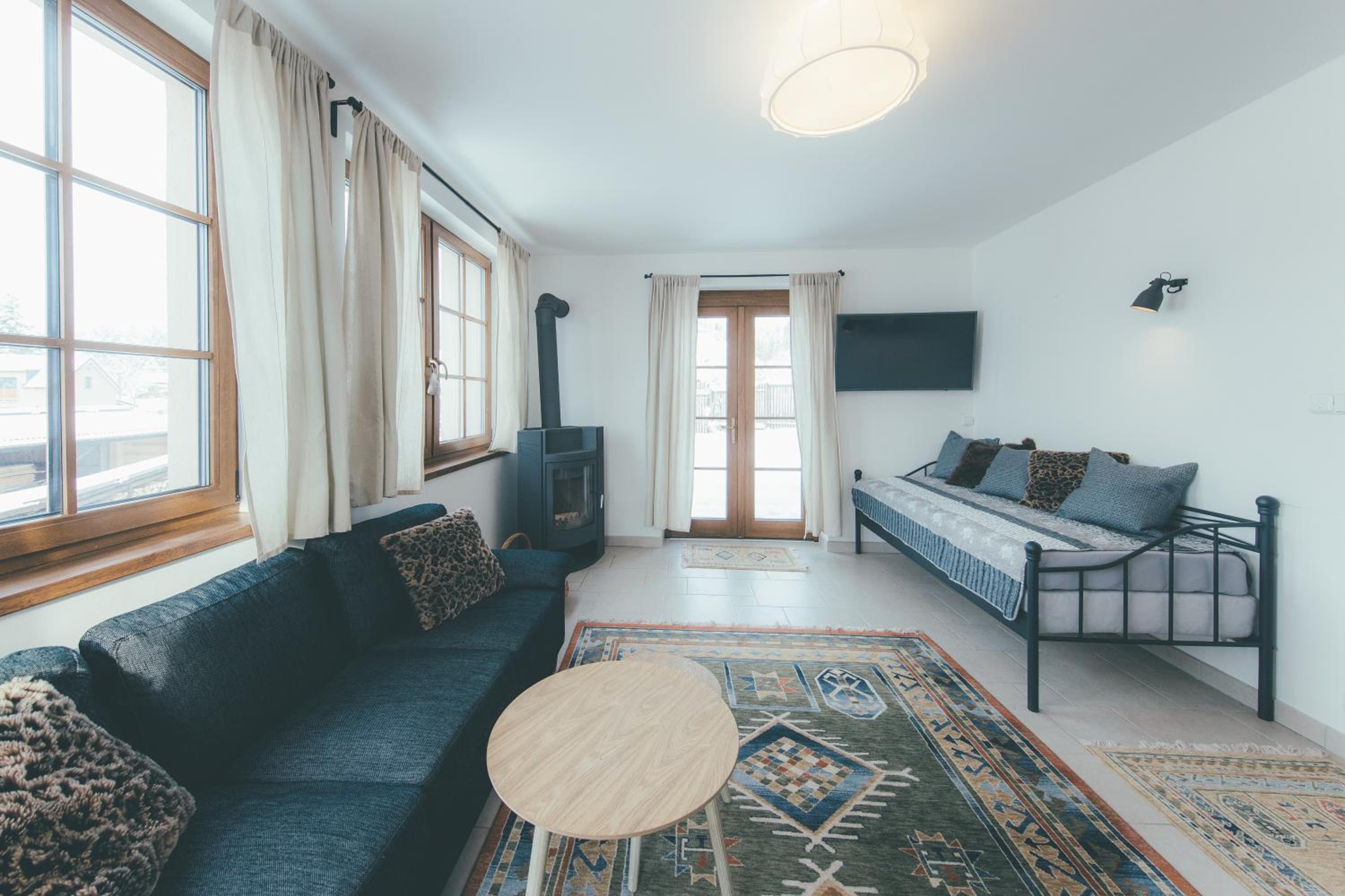 Stylová Lodge s vlastním koupáním & pergolou