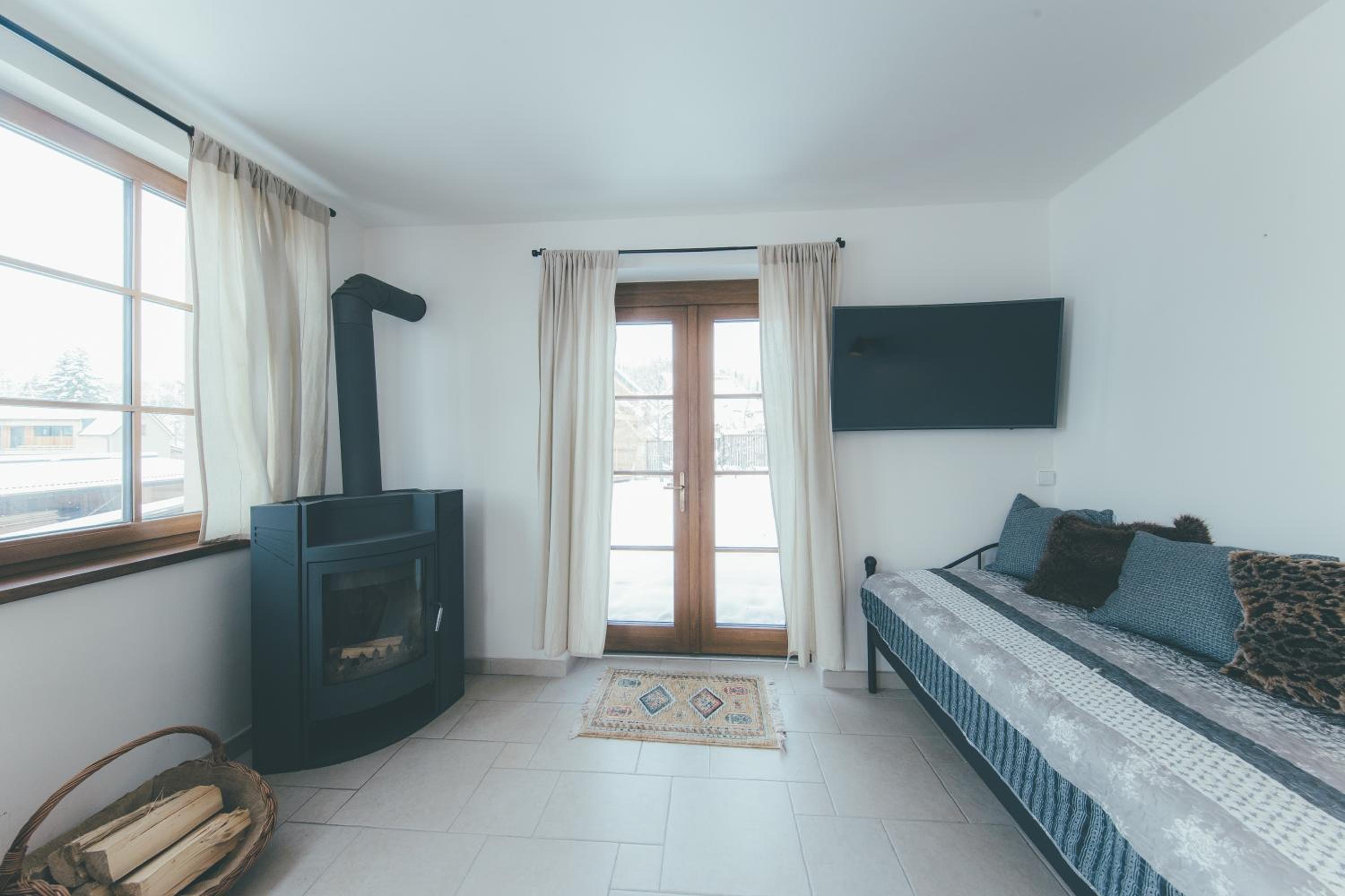 Stylová Lodge s vlastním koupáním & pergolou
