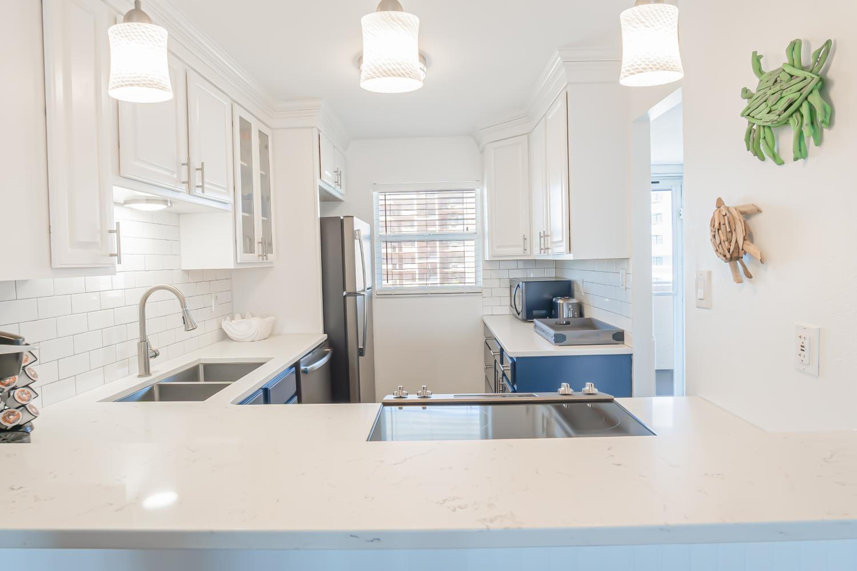 Top Floor with Ocean and Pool Views Located on No-Drive Beach