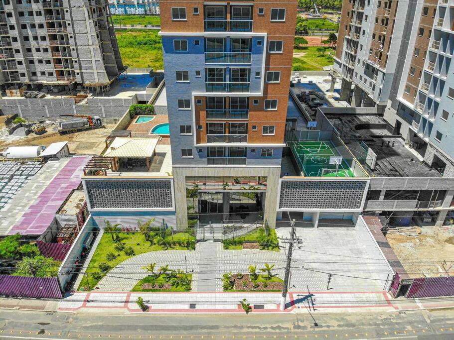 Ap novo em frente a shopping center e próximo a praia
