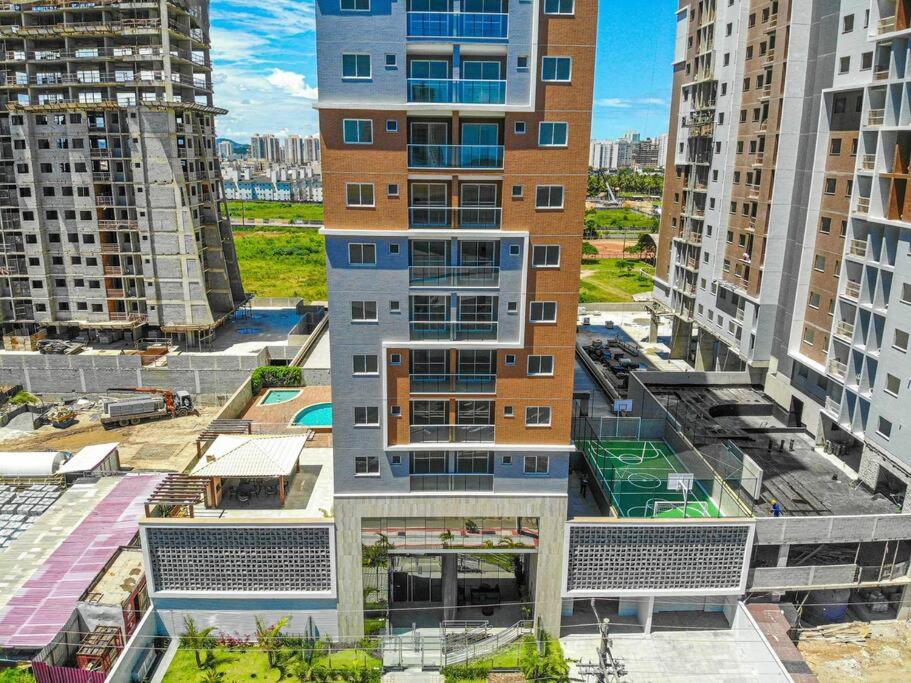 Ap novo em frente a shopping center e próximo a praia