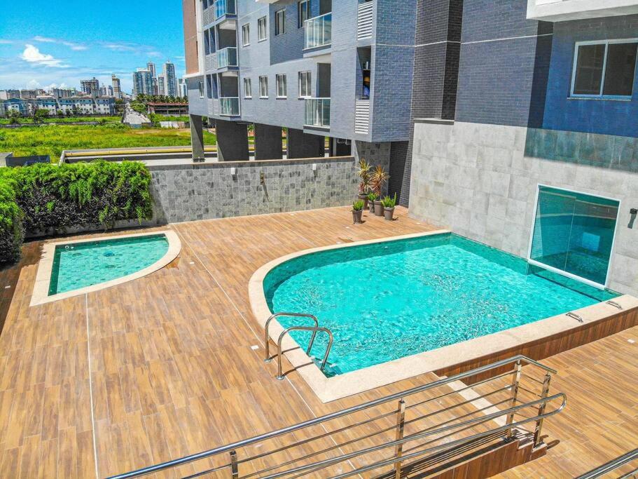 Ap novo em frente a shopping center e próximo a praia