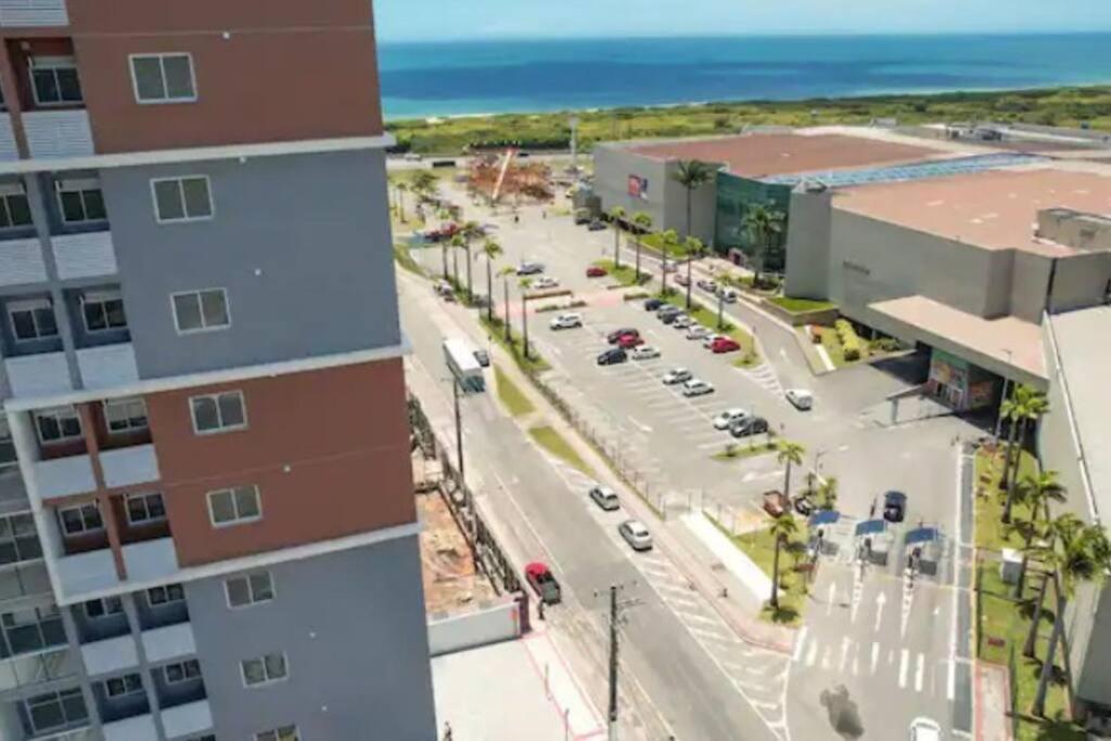 Ap novo em frente a shopping center e próximo a praia