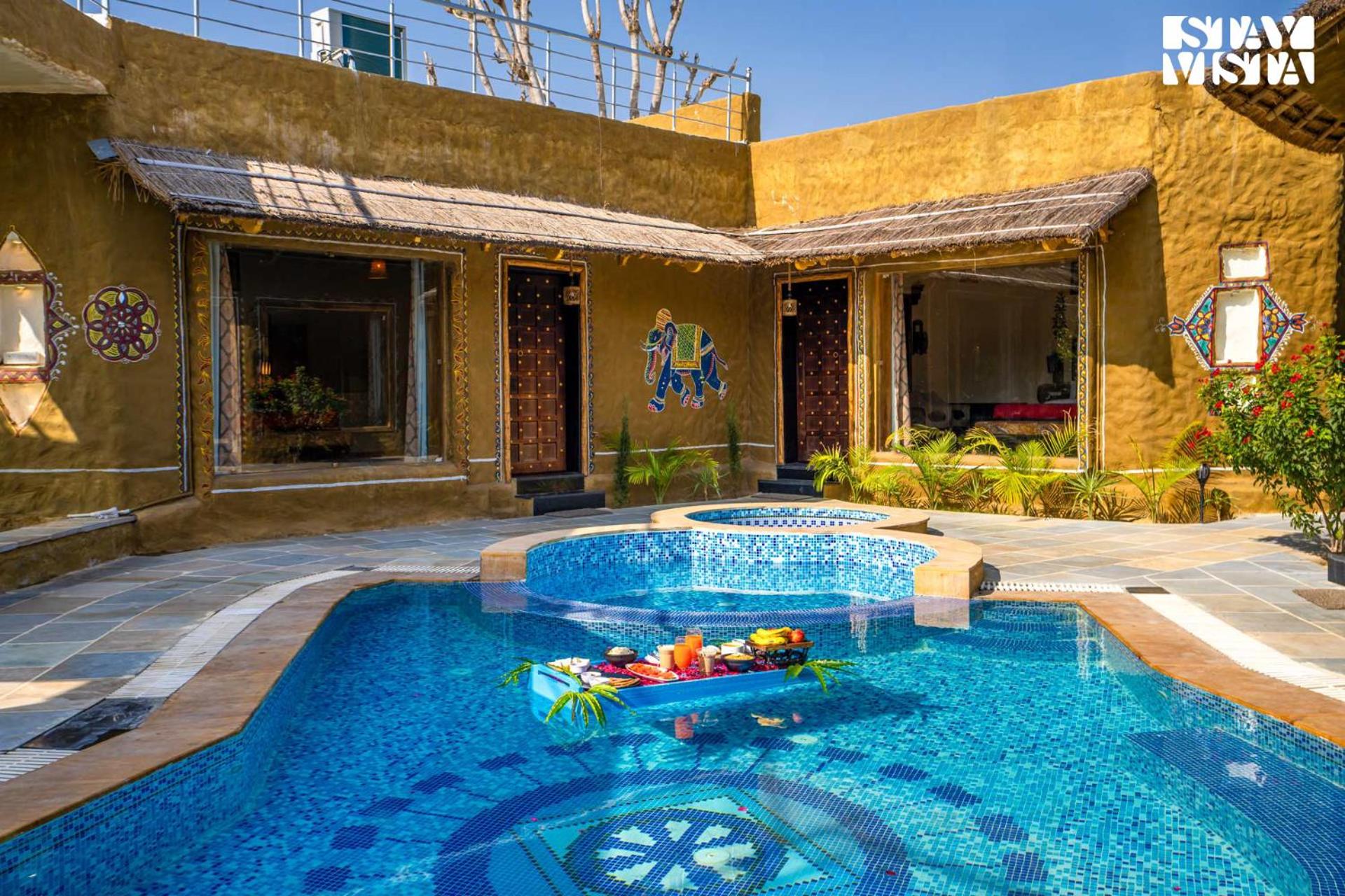 StayVista's Majestic Mud House - Rajasthani Architecture with Modern Amenities, Outdoor Pool, Adventure Activities, and Spa view 5