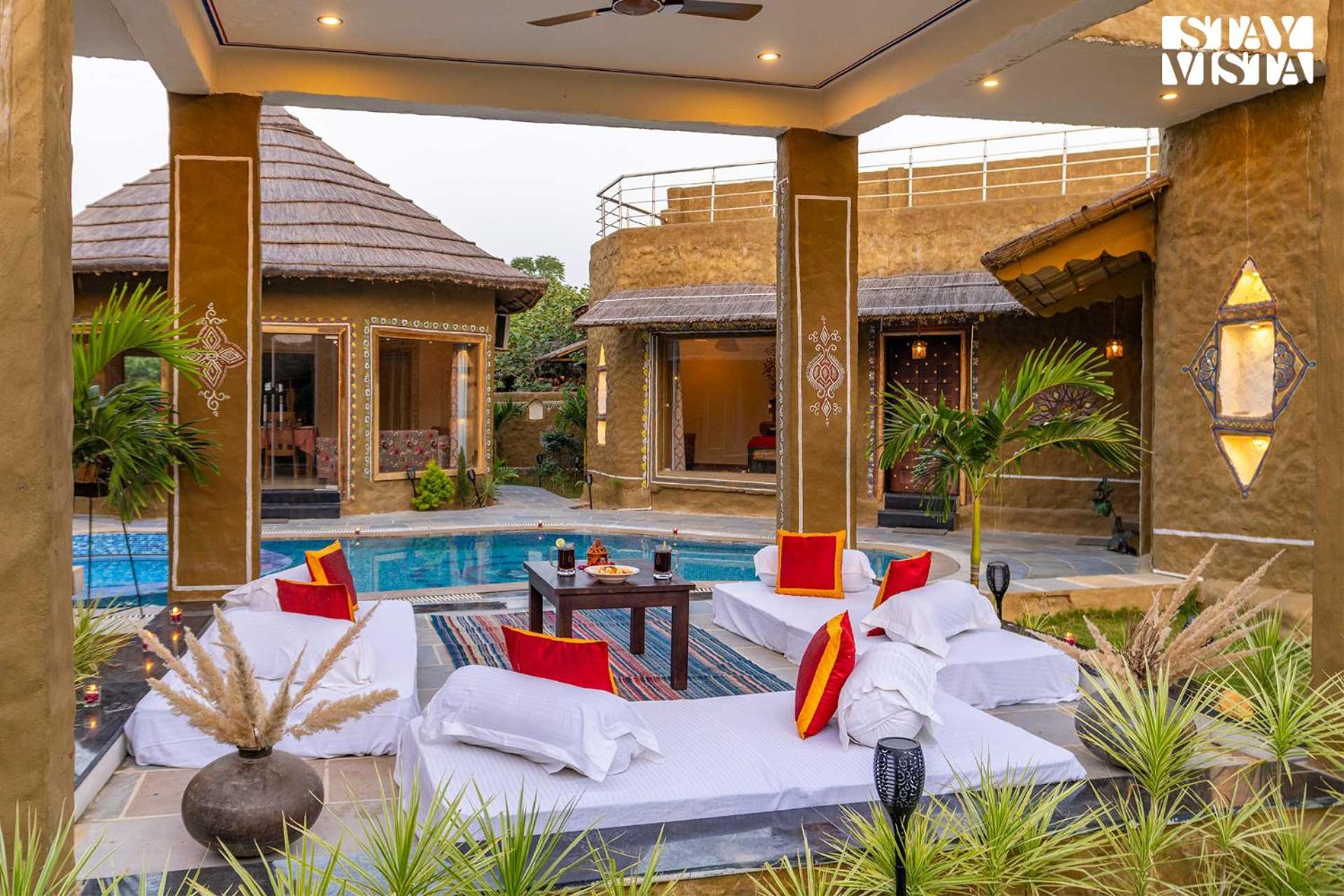 StayVista's Majestic Mud House - Rajasthani Architecture with Modern Amenities, Outdoor Pool, Adventure Activities, and Spa view 4