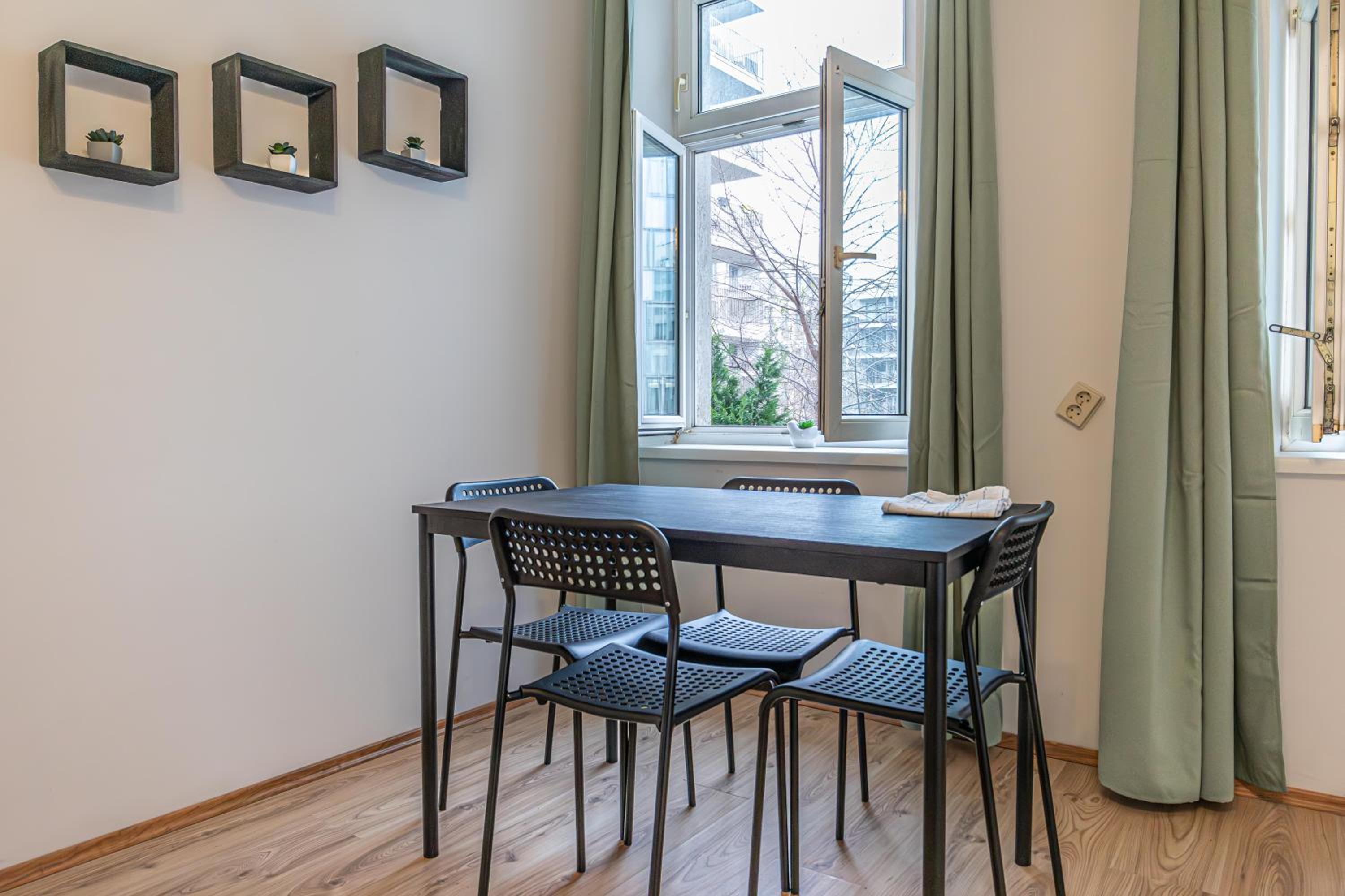 Enjoy The Danube and Prater Stern from Our 1BR Gem