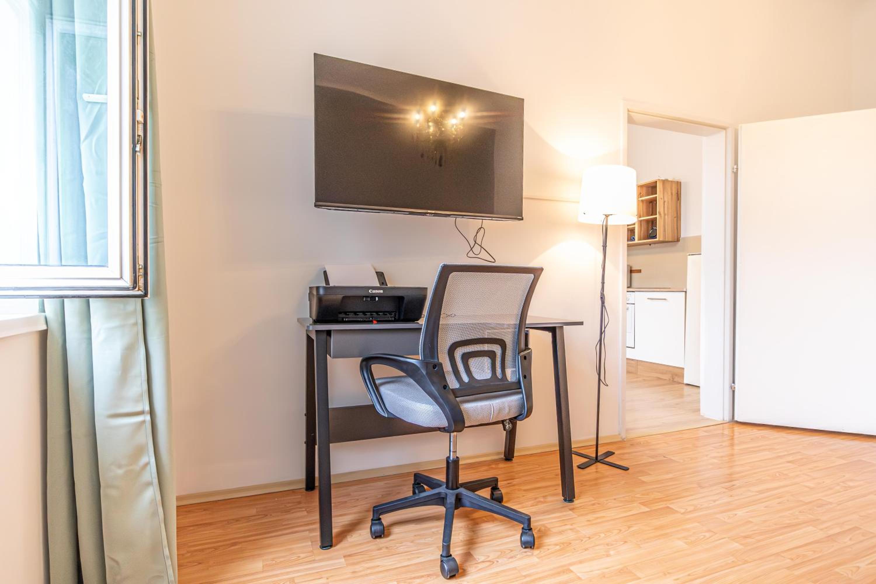 Enjoy The Danube and Prater Stern from Our 1BR Gem